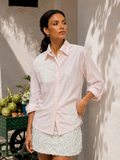Camisa de flores rosadas