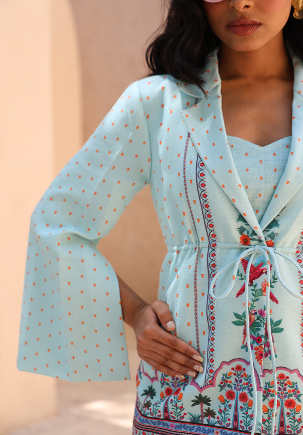 Close-up portrait of Birdsong printed blazer