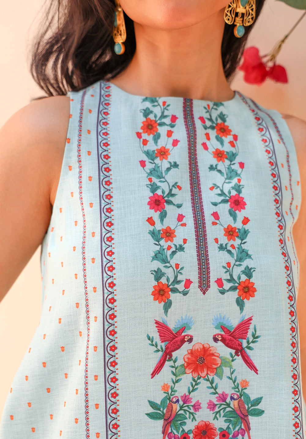 Close-up neckline and print detail of Birdsong sleeveless top