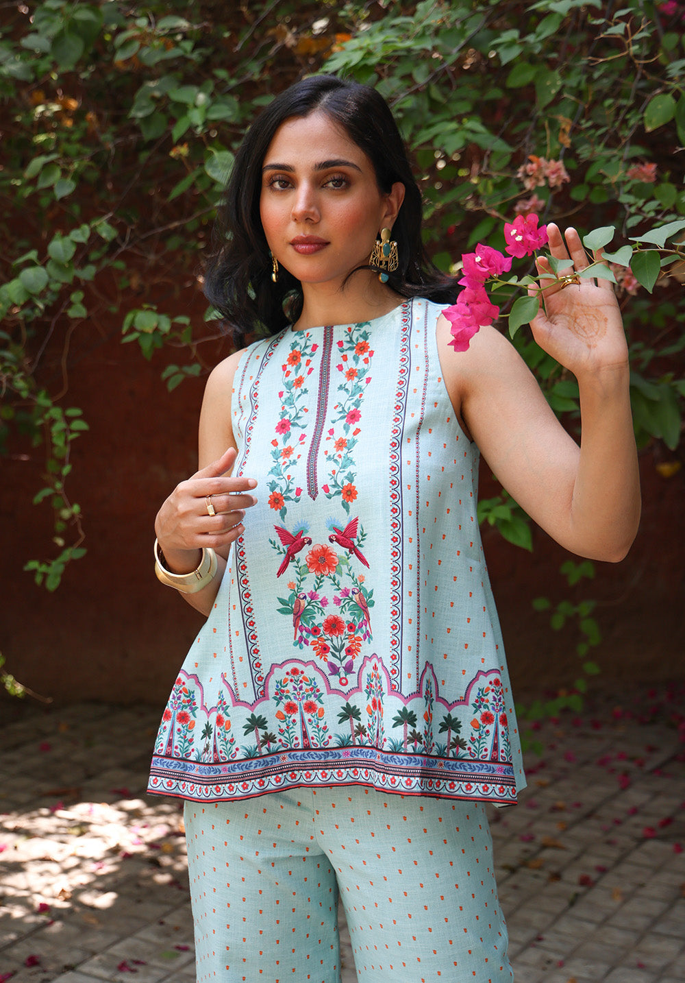 Portrait view of Birdsong embroidered sleeveless top