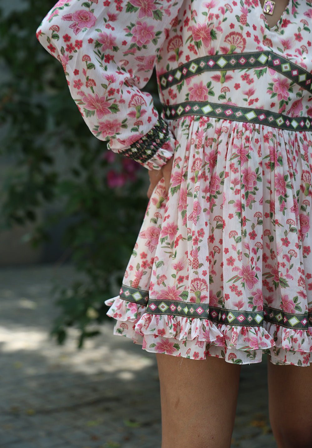Close-up of tiered hem detail on Elysia dress