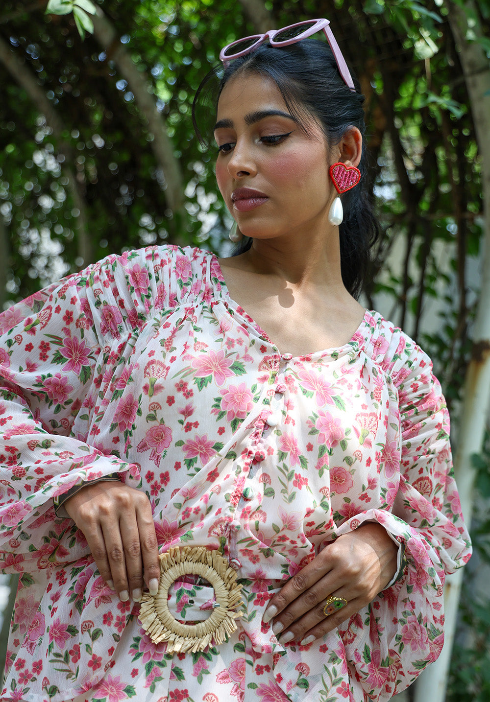 Close-up of floral print and sleeve detail on Serena top