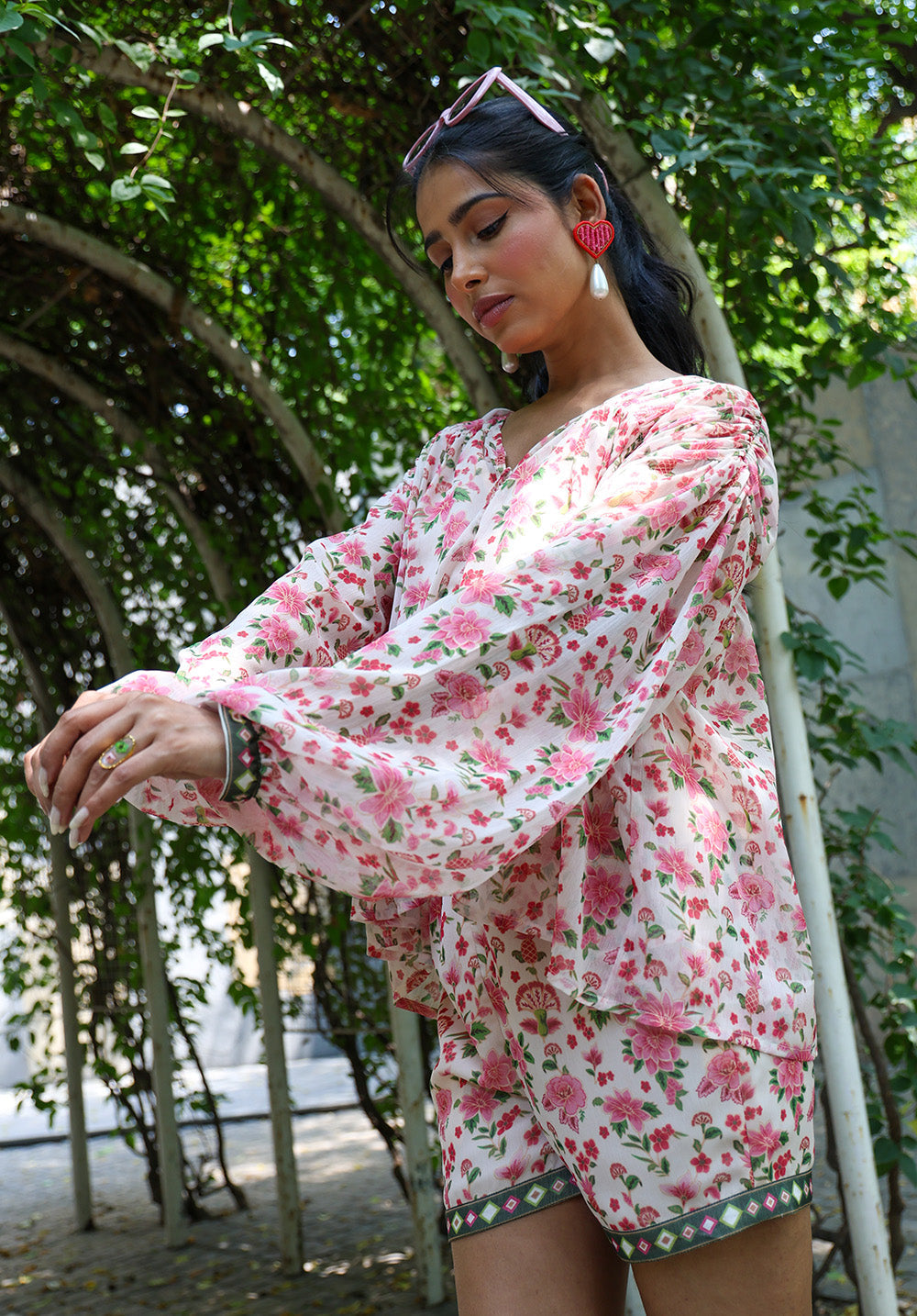 Side view highlighting voluminous sleeve detail on Serena top