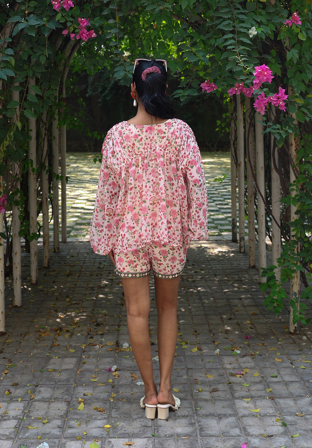 Close-up of waist detail on Serena floral top